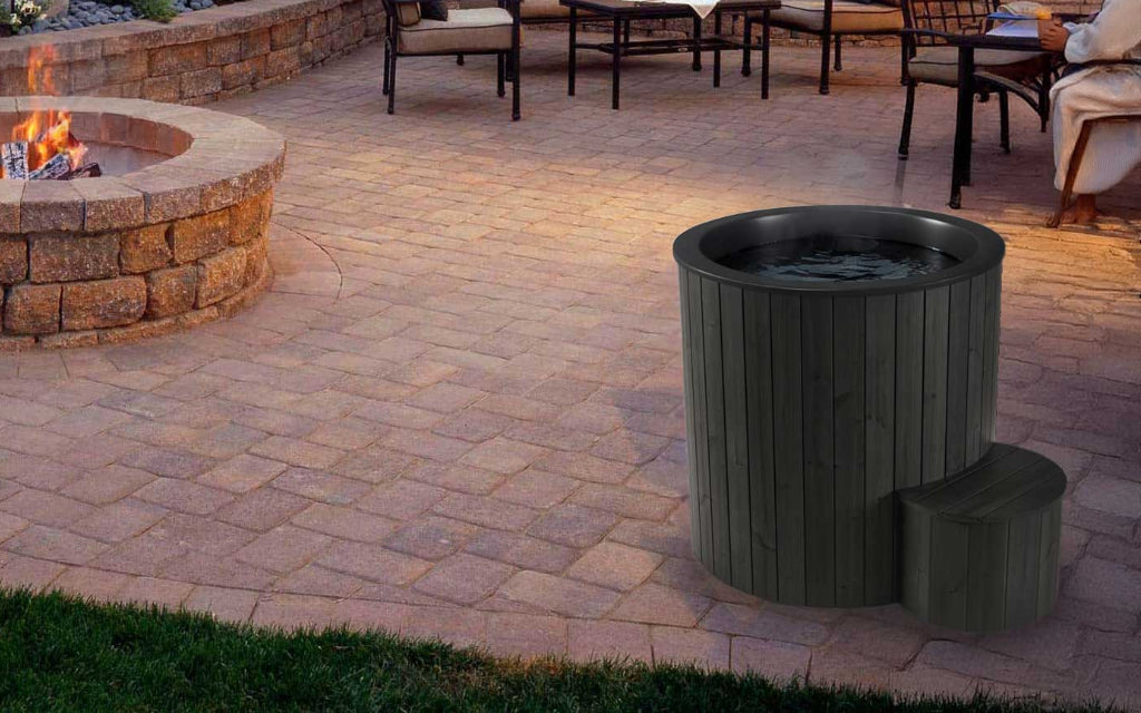 SaunaLife Model S1B black immersion tub - fire pit lifestyle