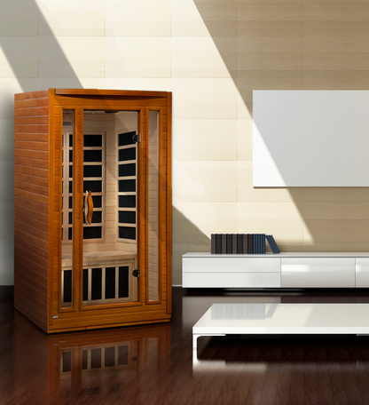 Sauna_and_Plunge_Direct-DYN-6206-01 Sauna- San Marino Elite Edition.
 2 persons
Exterior dimensions: 47" W x 42" D x 75" H (add 2" for roof overhang)
Interior dimensions: 43" W x 37" D x 68" H, Bluetooth, 2 dynamic speakers (no radio)
Control panels: Interior and exterior LED
Construction: Natural hemlock wood
Electrical service: 120V/15amp
Assembly: Clasp together
Heating elements: 6 Carbon low EMF panels
Door: Tempered glass
Lighting: Interior chromotherapy (red light therapy starting in 2024)
Roof vent